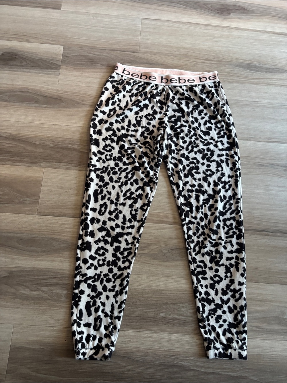 bebe Cream and Black Leopard Print Leggings with bebe Logo Waistband